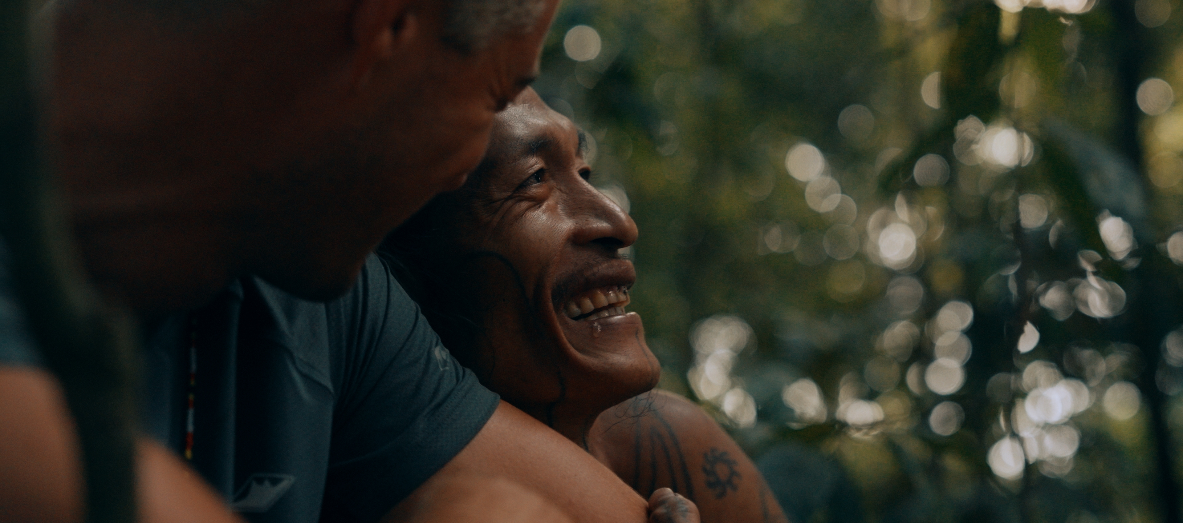 Blair laughing with a Mentawai tribe member